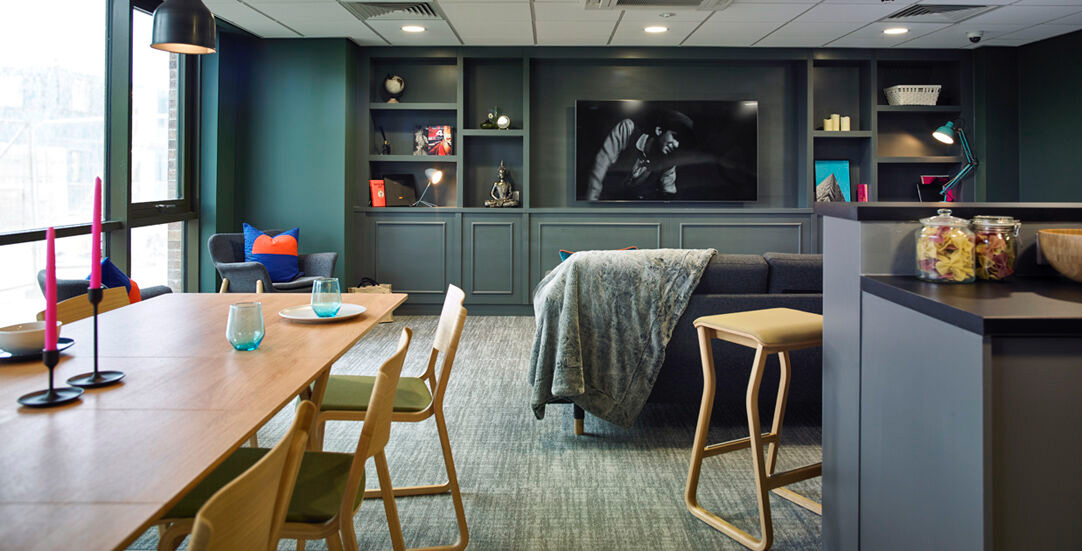 Extending Theo Table in natural oak, situated in apartment setting